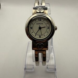 Geneva Women's  Silver-Tone  Cuff Bracelet with Heart Accents (New Battery)